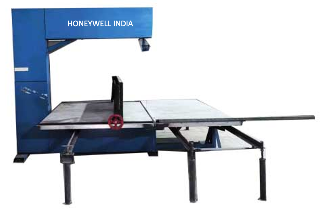 Precision sawing machine cutting cured honeycomb blocks to finished pad size